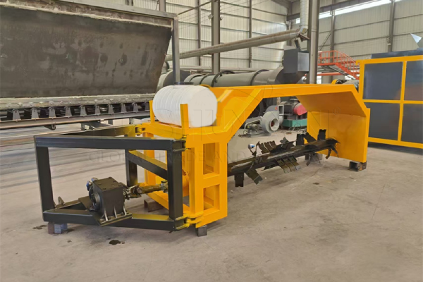 Tractor pulled composting machine with water tank